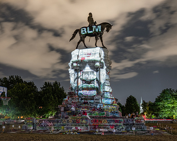 Kris Graves, George Floyd Projection Richmond Virginia, 2020. Peaceful protests at the Robert E. Lee Circle on Monument Ave. at night.