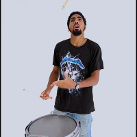 A picture of Jahleel Hills drumming
