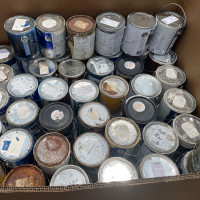 Large box holding several paint cans