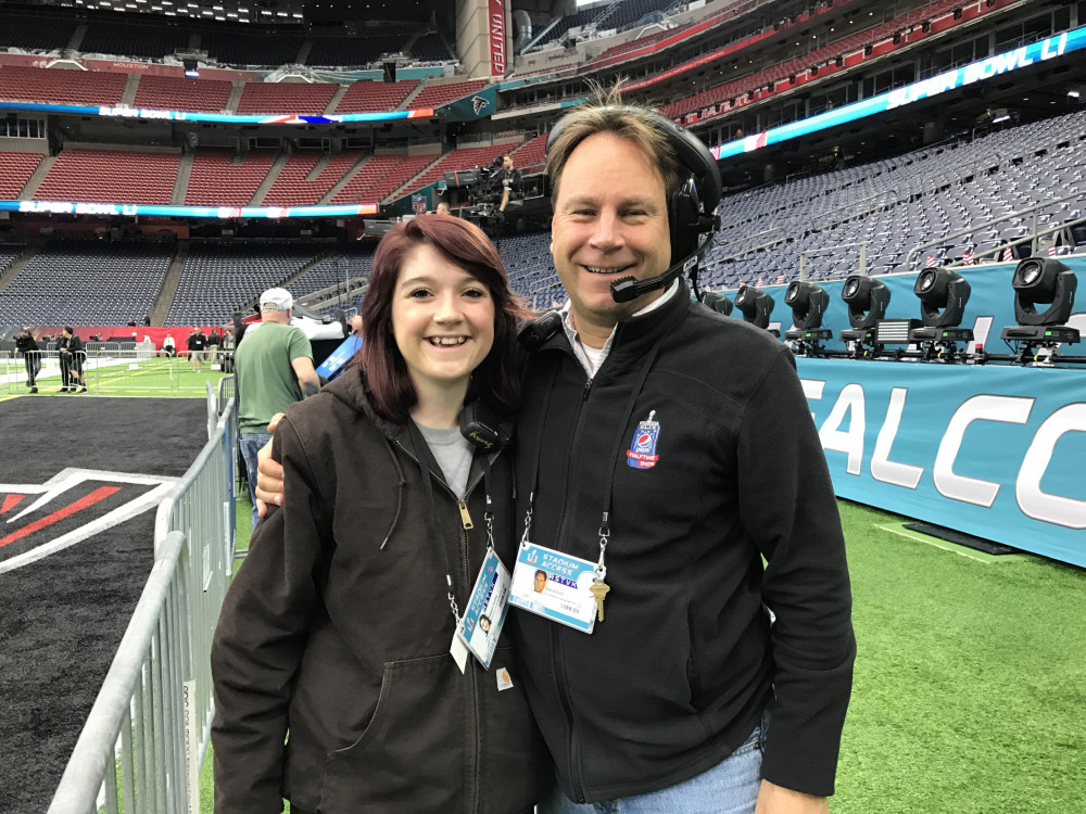 Design Tech student Megan Seibel with her professor Dave Grill at the Super Bowl