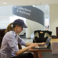 student working in library