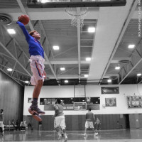 Max Pearce '18 slam dunks in the gym