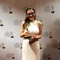 Rachel Weiss ?16 holds her NYC Emmy