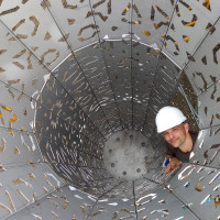 Director, School of Art+Design Christopher Robbins inside the sculpture on site at the American Riad project