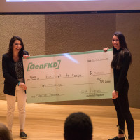 Seniors Angela Galli and Kelly Hayes receive oversized check for winning the second annual Start Up Purchase Pitching Competition