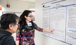 Student presents senior project research at the annual Natural and Social Science Symposium.