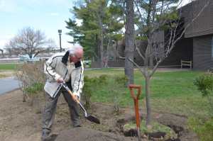 President Schwarz helps plant a tree for Clean and Green Day 2018