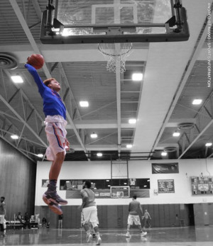 Max Pearce '18 slam dunks in the gym