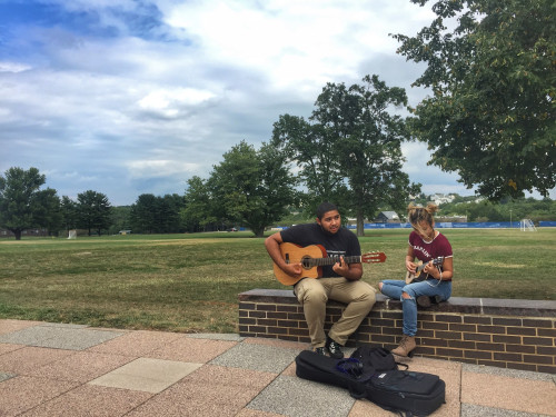 Students on Great Lawn Wall