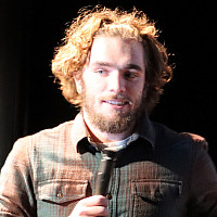 Oliver Culliton, class of 2025, pitching his proposal for Beyond the Blurb during the 2024 Shark Tank competition