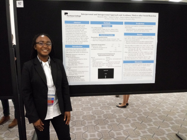 Mennefer Blue with her poster at the Association of Psychological Science Convention on May 26, 2019