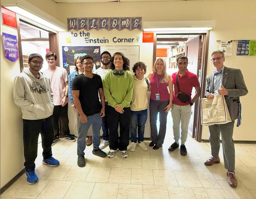Students standing outside Einstein Corner with President Michael Steiper, PhD and Coordinator Christie Kennedy