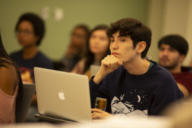 Student in the classroom with laptop