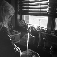 Mom Washing the Dishes, 2019, Digital Photograph,16 x 24