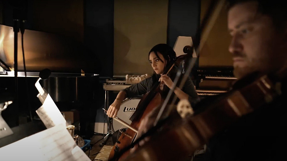 Kaitlyn Raitz '11, '12 playing cello in the Atwood Quartet