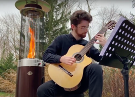 Student playing guitar