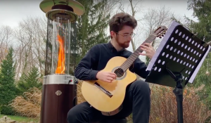 Student playing guitar