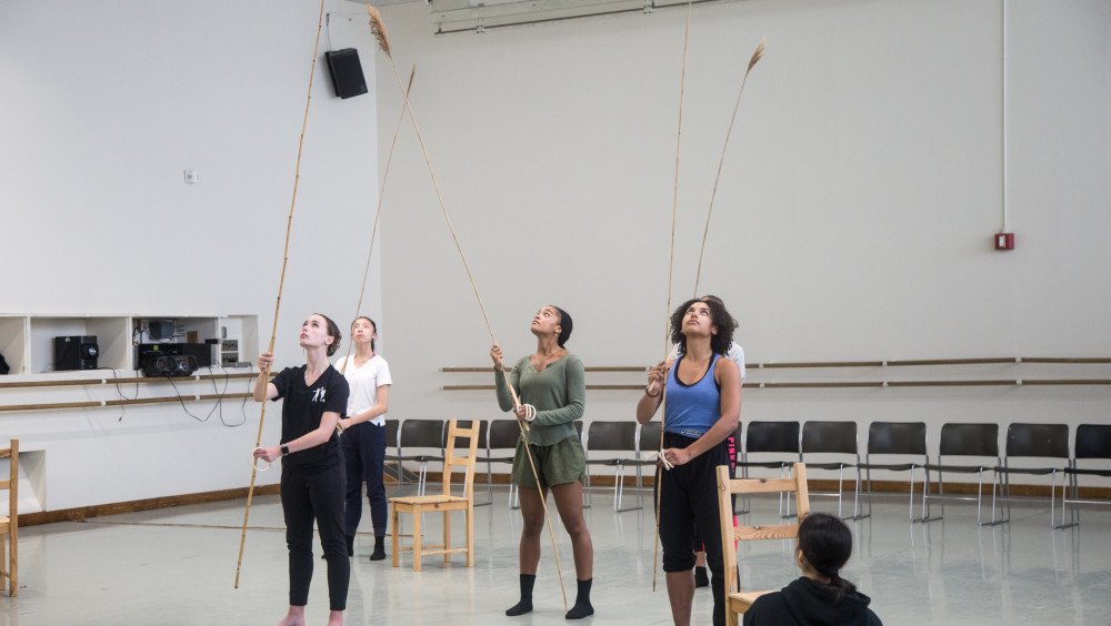 Student dancers in the studio with choreographer Luca Veggetti