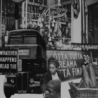 Old time black and white store signs.