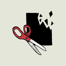 Scissors cutting a black background.