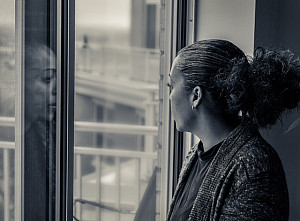 Poet and novelist Quan Barry looking out a window