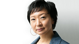 Headshot of Cathy Park Hong in blue blazer