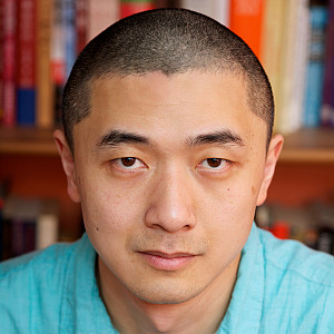 close up of man's face not smiling