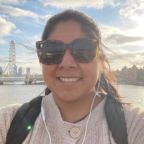 Stephanie Sanchez with London skyline behind.