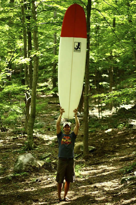 Stephen Jumper '09 with his handcrafted surfboard.
