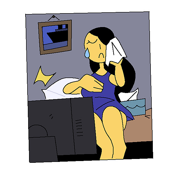 Woman crying in front of a television.
