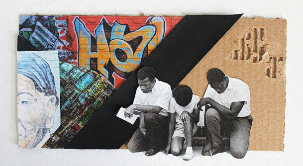 Three men kneeling on cardboard mural.