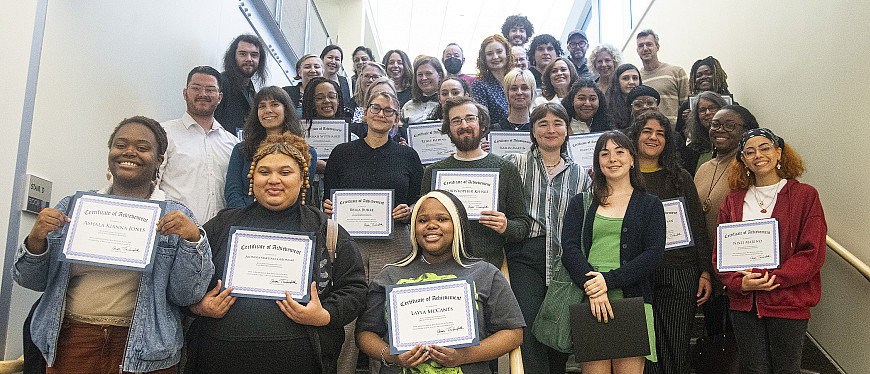 2023 Symposium participants proudly display certificates.