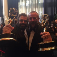 Jonah Kaplan '93 and Shane Smith of Vice Media hold their Emmy® Awards