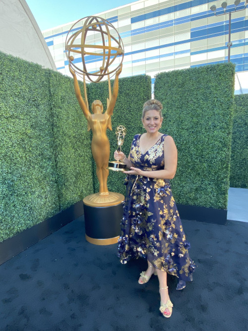 Melissa Shakun MFA '08 holds her Emmy® award