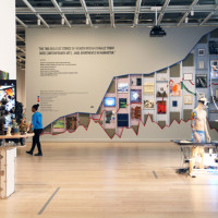 Occupy Museums, Debtfair, 2017 (back), works by Jon Kessler (front). Photo: Henri Neuendorf