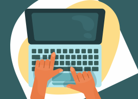 Typing on a laptop