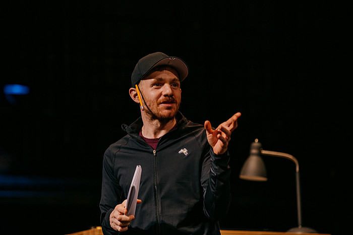 Chris Perfetti '11 onstage in Inherit The Wind (Pasadena Playhouse 2023)