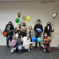 Students from the class Michael Chekhov Technique: Psychophysical Acting hold balloons from the p...