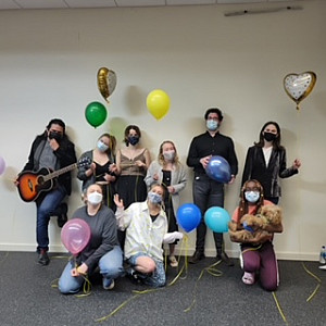 Students from the class Michael Chekhov Technique: Psychophysical Acting hold balloons from the performance finale.