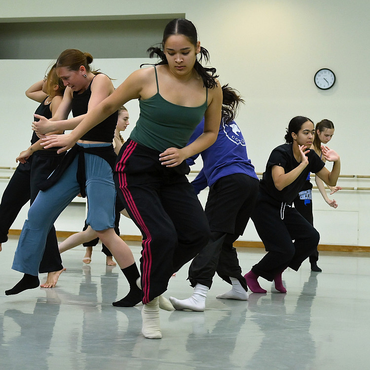 Dancers in rehearsal studio