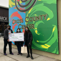 From left, Benjamin Santiago, lecturer in graphic design, Liz Pollack, senior marketing manager at Cross County Center, and Stella Nova P...