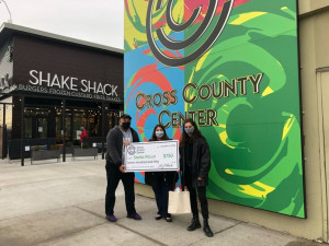 From left, Benjamin Santiago, lecturer in graphic design, Liz Pollack, senior marketing manager at Cross County Center, and Stella Nova P...