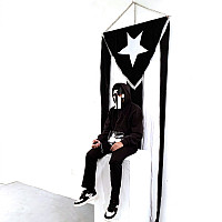 Defense, rocks, live performer Black hoodie, vinyl, and flag produced by Meila Migdalia, to scale, 2019