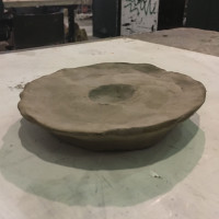 Clay sculpture on table