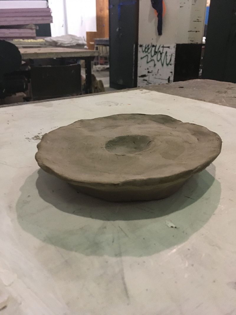 Clay sculpture on table 