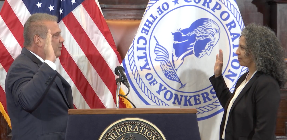 Yonkers Mayor Mike Spano and Judge Karen T. Beltran '02 at the swearing-in ceremony.