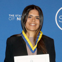 SUNY Chancellor John King, Sonia Seth '23 holding a certificate, and Director of the School of Natural and Social Sciences Rudolf Gaudio.