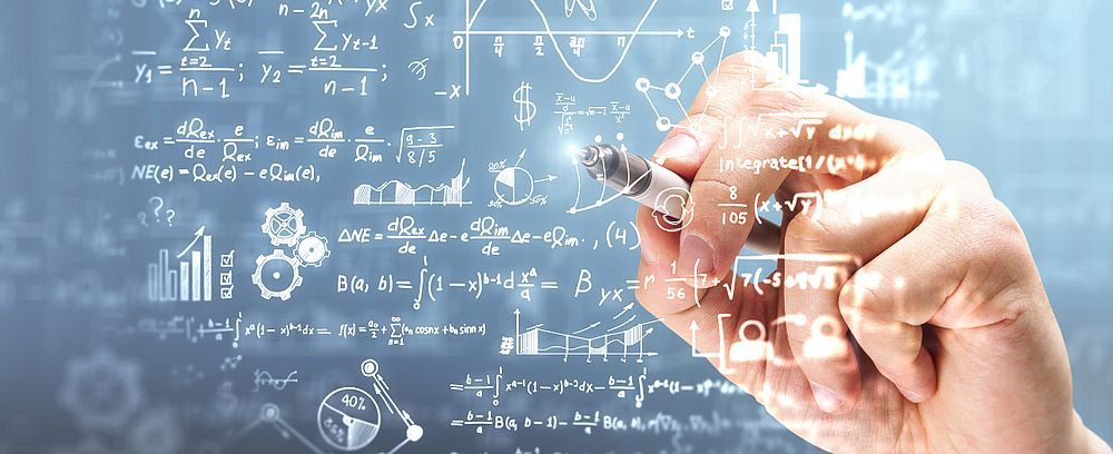 Male hand writing mathematical formulas on blurry background. Science and algebra concept. Double exposure