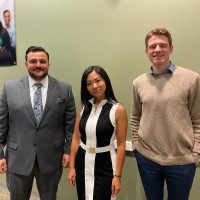 Standing left to right: David Settanni '09, Lynn Lin '14, Devon Donahue '19