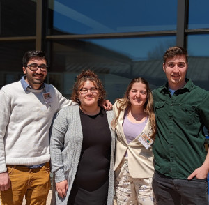 Eric, Paola, Gianna, and Joe happy to be done with their presentations on Saturday!